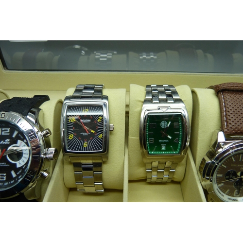 933 - Six wristwatches in a display case including Sekonda and Aviatime