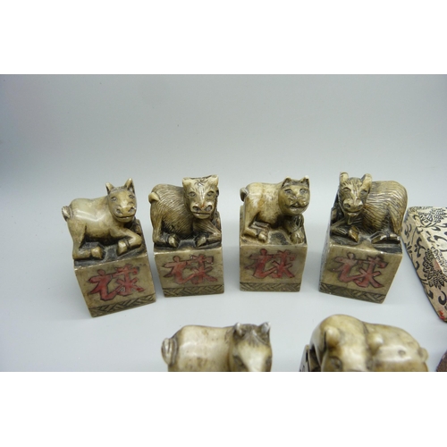 946 - Oriental carved stone seals and two netsukes