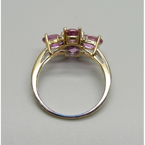 959 - A silver gilt and pink stone cluster ring, S