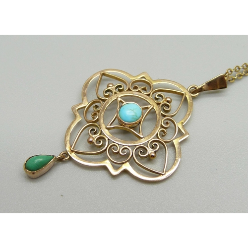 969 - A 9ct gold and turquoise pendant on a 9ct gold chain, 3.3g, 4cm pendant length