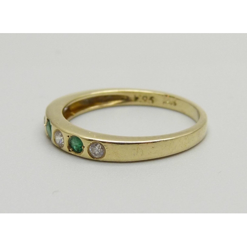 978 - A 14k gold, emerald and zircon ring, 2.6g, O