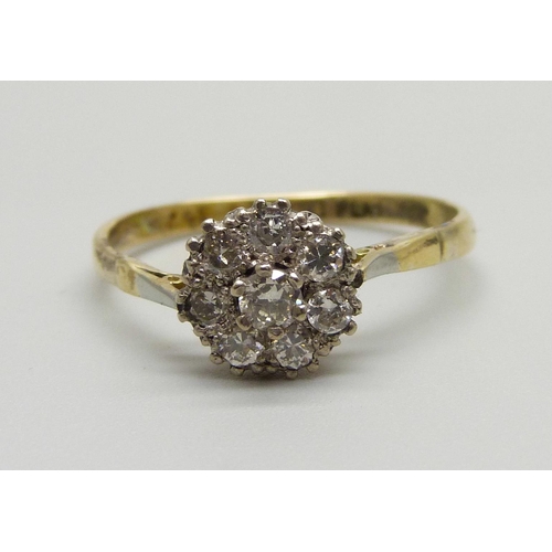 982 - An 18ct gold and platinum diamond cluster ring, 2.6g, T