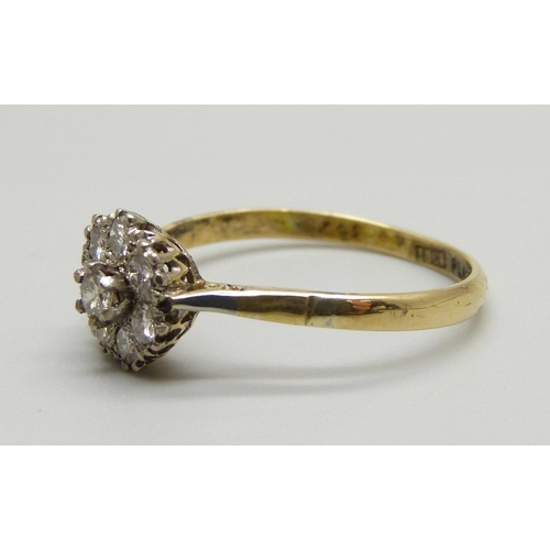 982 - An 18ct gold and platinum diamond cluster ring, 2.6g, T