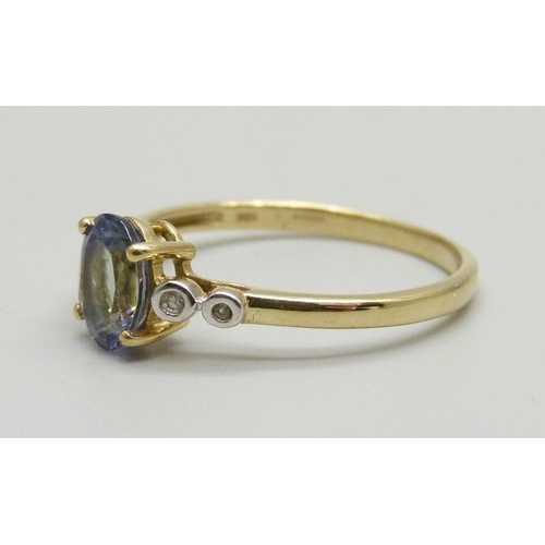 984 - A 9ct gold, bi-colour tanzanite and zircon ring with certificate, 2.2g, U