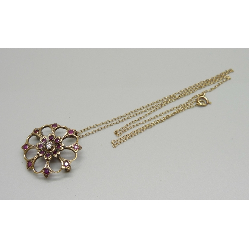 996 - A yellow metal, ruby and diamond pendant/brooch on a 9ct gold chain, pendant stamped 9K, 5g, 2.6cm p... 