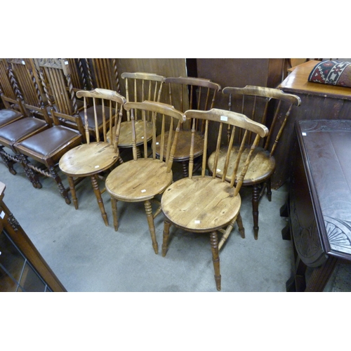 135 - A set of six Victorian beech penny seat kitchen chairs