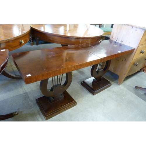 160 - A pair of Art Deco style simulated rosewood lamp tables