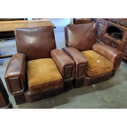 187 - A pair of Art Deco brown leather club chairs