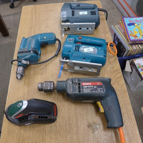 2037 - 4 Assorted power tools- including black and decker jigsaws, Bosch drills, plus one other Bosch screw... 