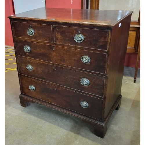 23B - A George III oak chest of drawers