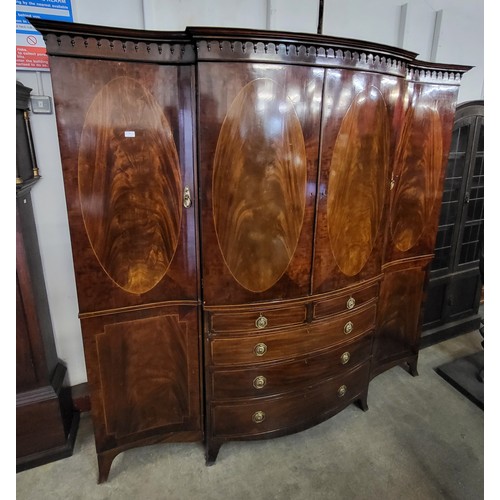 36 - A George III inlaid mahogany breakfront combination wardrobe