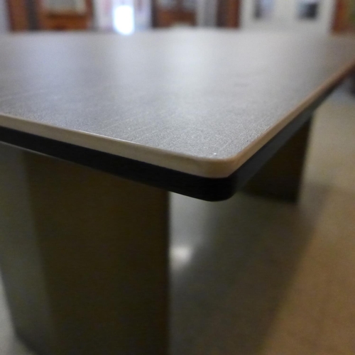 1301 - A grey ceramic topped dining table