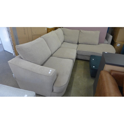 1505 - A sandstone upholstered RHF five seater corner sofa/chaise