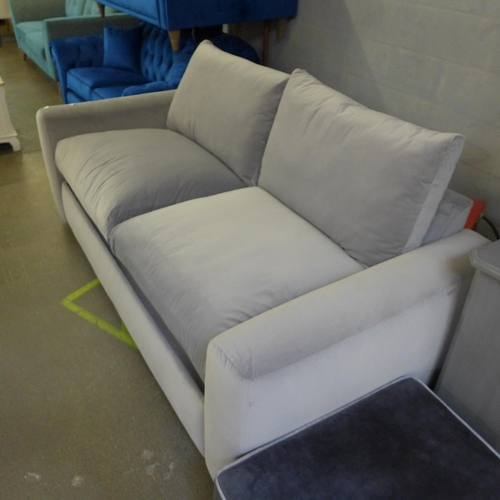 1518 - A light grey velvet upholstered modular three seater sofa