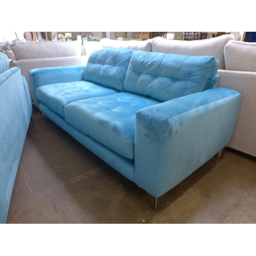 1526 - A pair of sky blue velvet three seater sofas