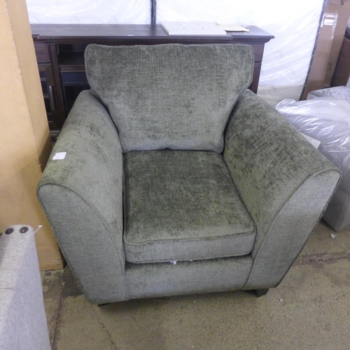 1580 - A moss green upholstered armchair