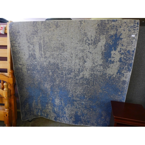 1634 - A blue and grey ground contemporary carpet (2m x 3m)