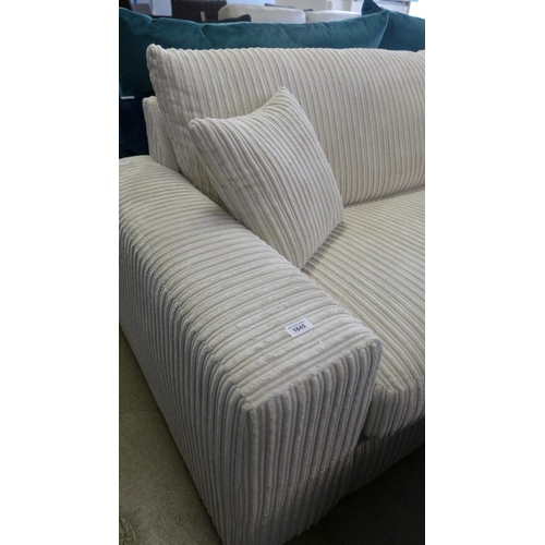 1645 - A cream jumbo corduroy 4.5 seater sofa with footstool - marked