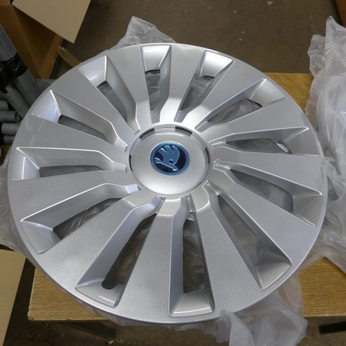 2435 - Set of four silver wheel trims for a Skoda