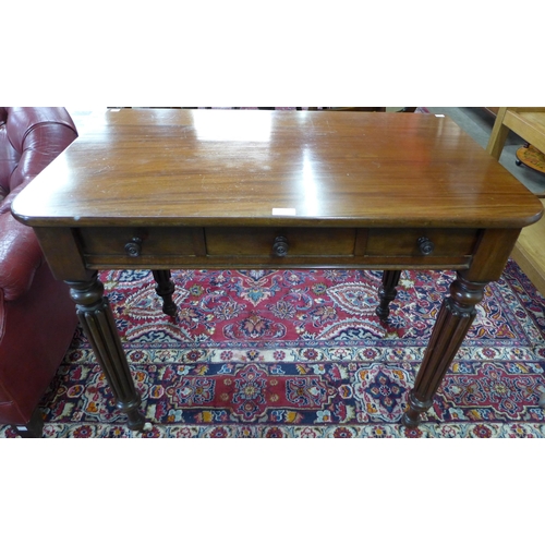 10 - An early Victorian mahogany three drawer writing table, manner of Gillows, Lancaster