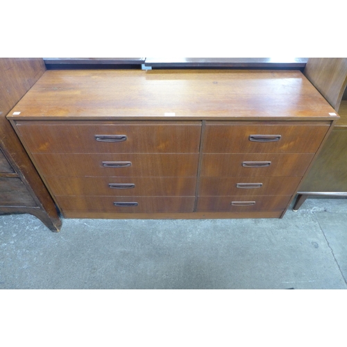 101 - A teak chest of drawers