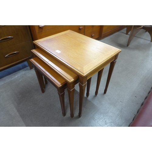 102 - A teak nest of tables