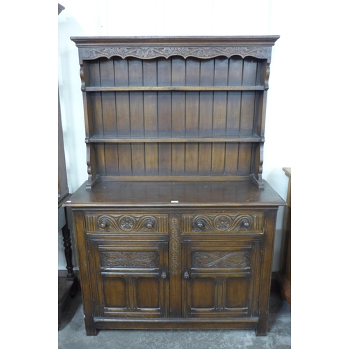 158 - A 17th Century style carved Ipswich oak dresser