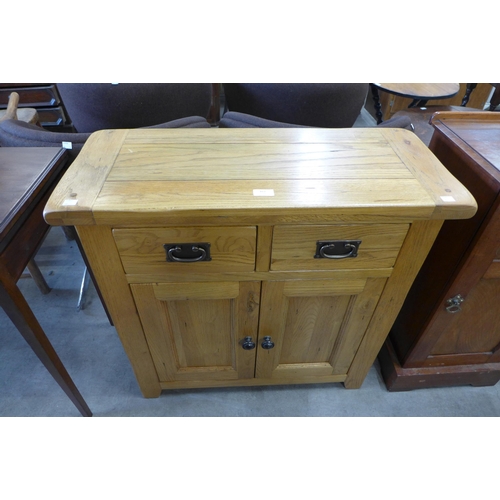 162 - A small oak sideboard