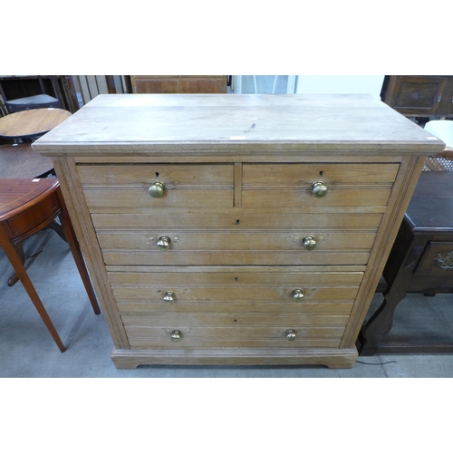 166 - A Victorian ash chest of drawers