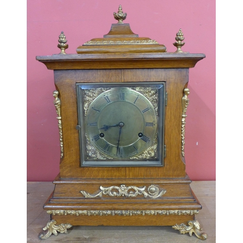 17 - A 19th Century German oak and gilt metal mounted Whittington chime bracket clock