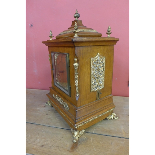 17 - A 19th Century German oak and gilt metal mounted Whittington chime bracket clock