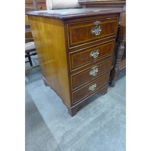 179 - A Charles Lowe burr walnut leather topped filing cabinet