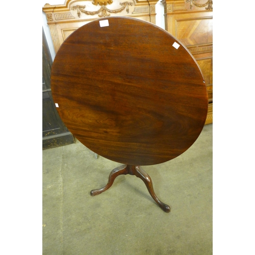 180 - A George III mahogany circular tilt-top tripod tea table