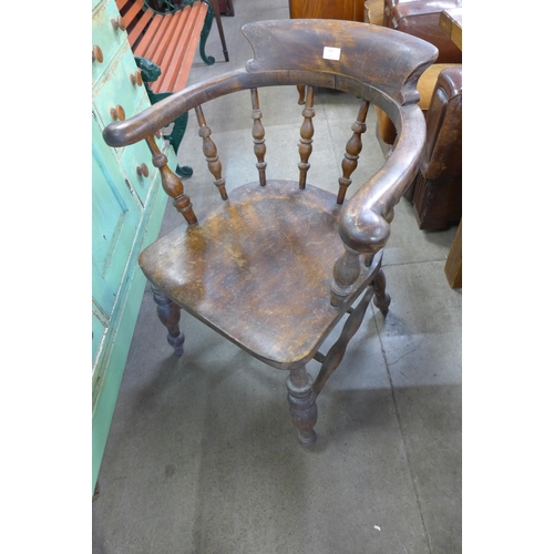 190 - A Victorian elm and beech smokers bow chair