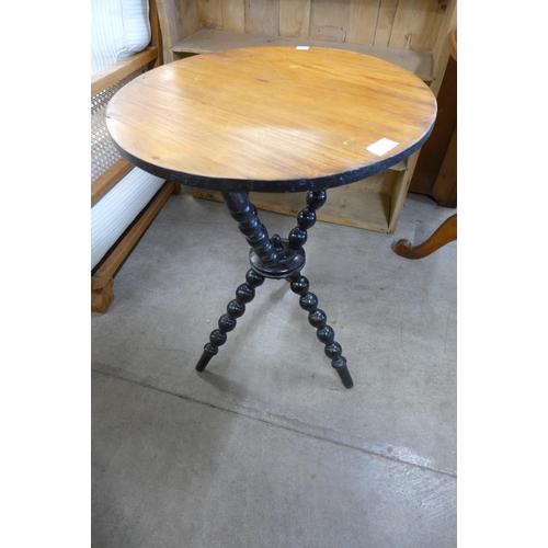 196 - A Victorian pine topped circular gypsy table