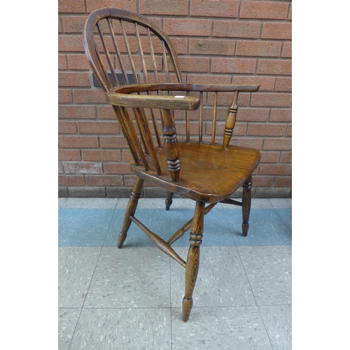 2 - A pair of similar Victorian elm and ash Windsor chairs