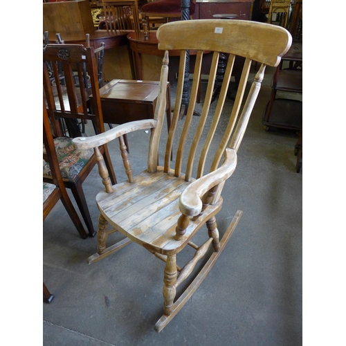 204 - A beech farmhouse rocking chair