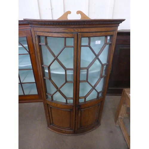 207 - Two George III oak wall hanging cupboards