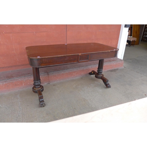 221A - A Regency mahogany two drawer library table