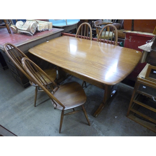 227 - An Ercol Golden Dawn elm and beech refectory table and four Quaker chairs