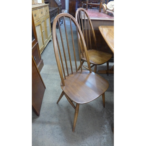 227 - An Ercol Golden Dawn elm and beech refectory table and four Quaker chairs