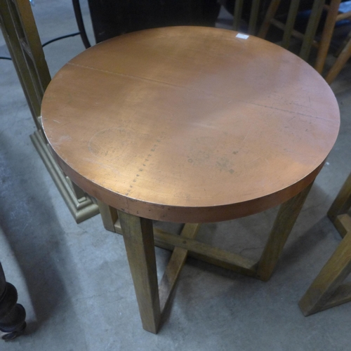 242 - A pair of oak and copper topped circular occasional tables