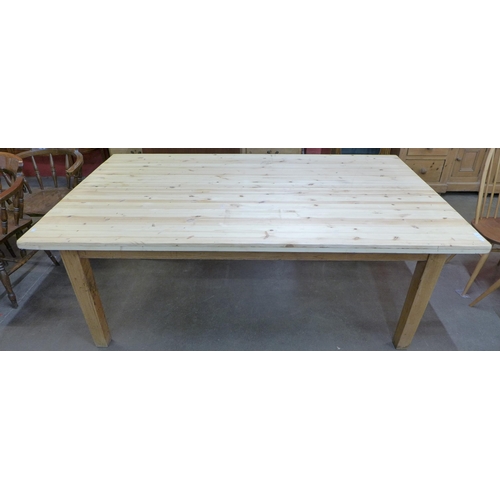 28 - A large 19th Century and later pine two drawer farmhouse kitchen table