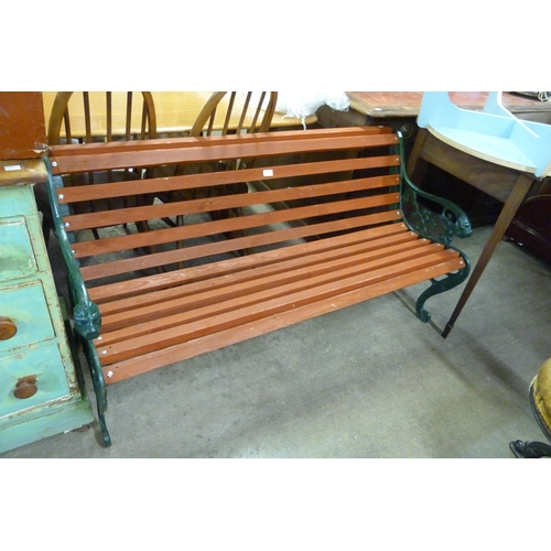 289 - A painted cast alloy ended garden bench