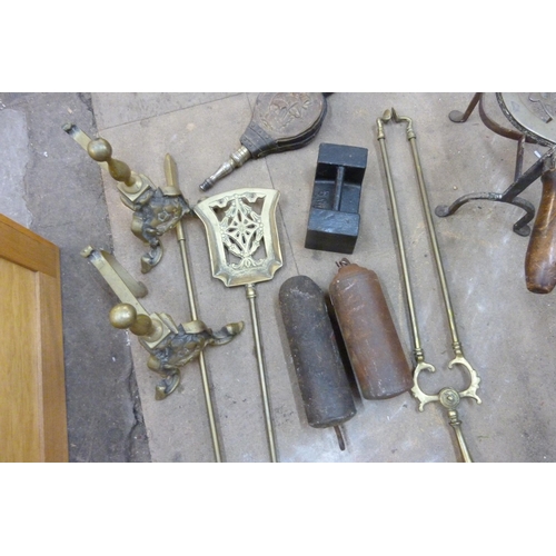 301 - A brass companion set, fire bellows, etc.