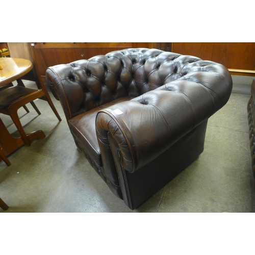 33 - A Thomas Lloyd chesterfield brown leather Chesterfield club chair