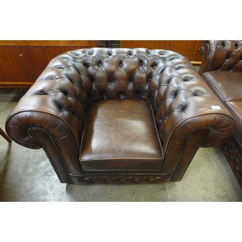 33 - A Thomas Lloyd chesterfield brown leather Chesterfield club chair