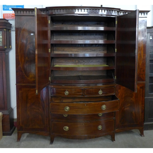 36 - A George III inlaid mahogany breakfront combination wardrobe