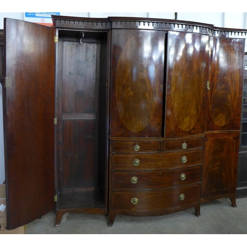 36 - A George III inlaid mahogany breakfront combination wardrobe