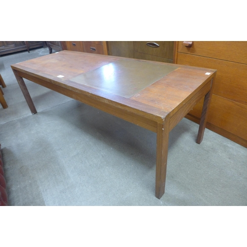 51 - Two teak coffee tables